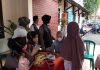 Srikandi Squad 01 Polres Merangin, Terus Himbau Masyarakat Untuk Melaksanakan Vaksinasi dan Pembagian Masker Gratis